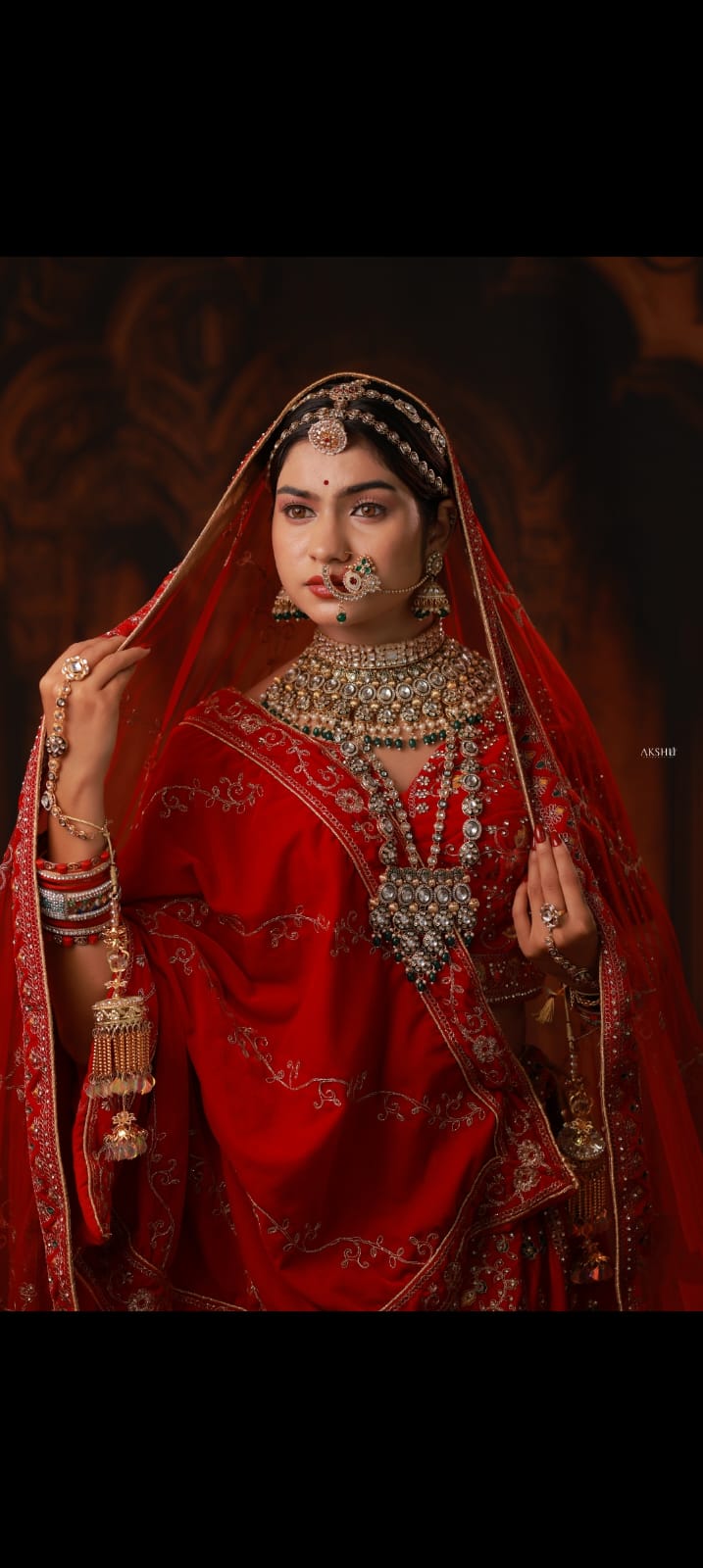 Signature red saree bridal look by Shital Gurav